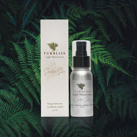 1. Turbliss Matte Face Cream 50ml with packaging, set against a natural fern background