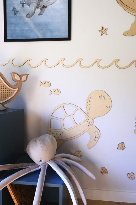 4. Wooden turtle wall decoration with fish and shell extras on a light wall, part of the Ocean Collection by Cut It Now