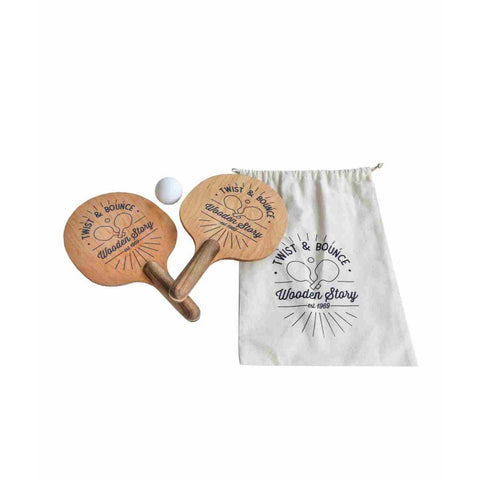 4. Wooden ping pong paddles with 'Twist & Bounce' logo and a white ball next to a branded cotton bag on a white background