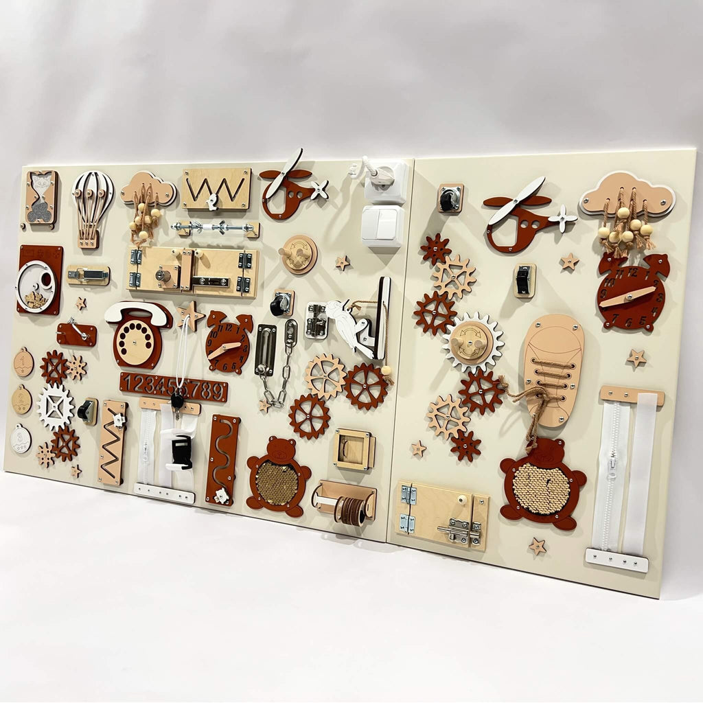 2. Two-piece wall activity panel in red and beige featuring interactive gears, locks, and numbers for children's play, mounted on a white background.