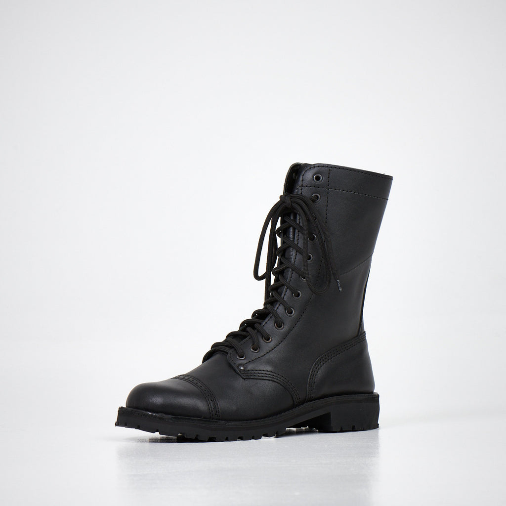 3. Angled view of AIPI 2.2 handmade leather boots in black, featuring rugged design and genuine leather material