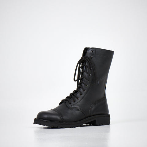 3. Angled view of AIPI 2.2 handmade leather boots in black, featuring rugged design and genuine leather material