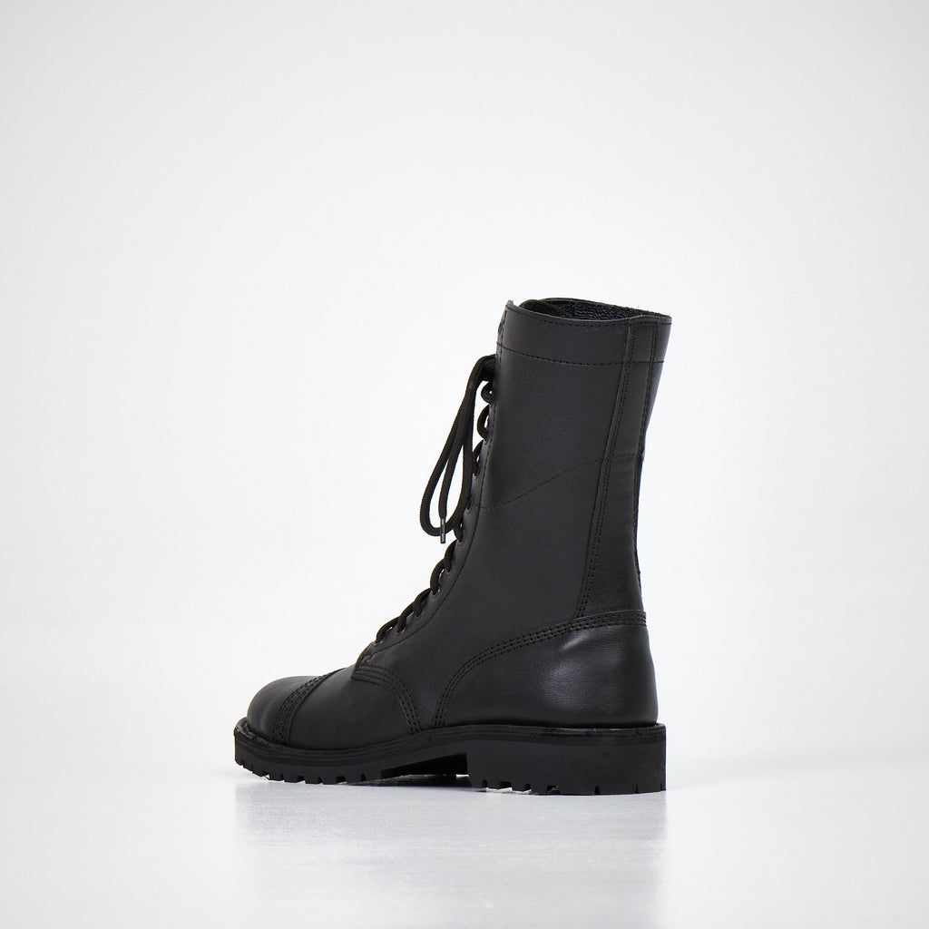 2. Back view of AIPI 2.2 handmade leather boots in black, highlighting durable construction and leather finish