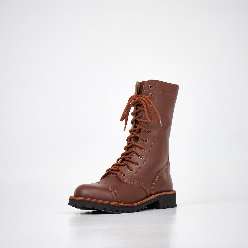 1. AIPI 2.2 handmade brown leather boots with lace-up closure, shown in studio setting
