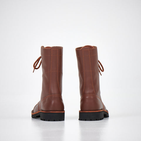 3. Back view of AIPI 2.2 handmade brown leather boots showing durable construction