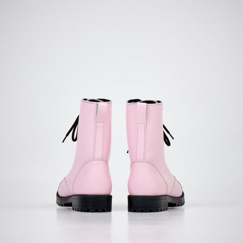 4. Women's 511 Pink boots by Samelin in studio, rear view displaying black laces and sturdy construction