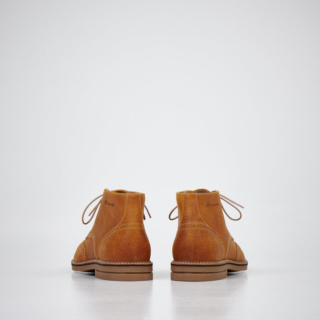 4. Men's light brown ankle boots by Samelin in studio, back view displaying heel and stitching details