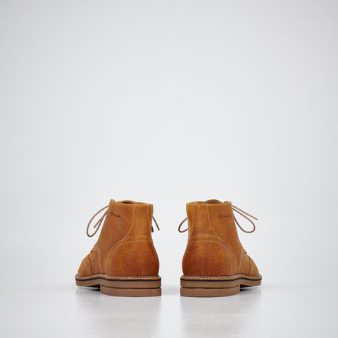 4. Men's light brown ankle boots by Samelin in studio, back view displaying heel and stitching details