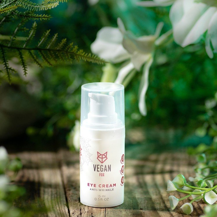 3. Vegan Fox Anti-Wrinkle Eye Cream bottle in a natural setting with green foliage