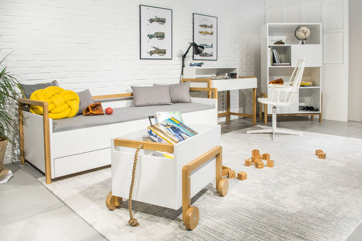 1. Victor daybed with drawers in a modern kids' room setting, surrounded by toys and books, showcasing its functional design