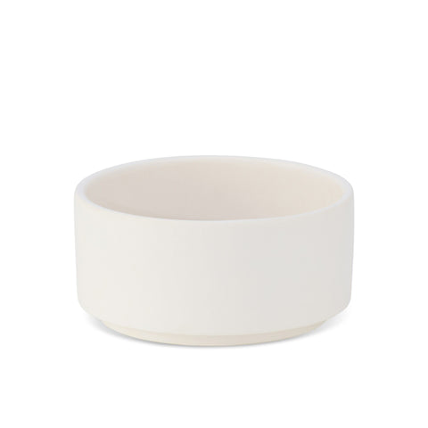 2. White ceramic pet bowl by Labbvenn with a minimalist design, shown on a clean white background highlighting its smooth finish and sturdy construction.