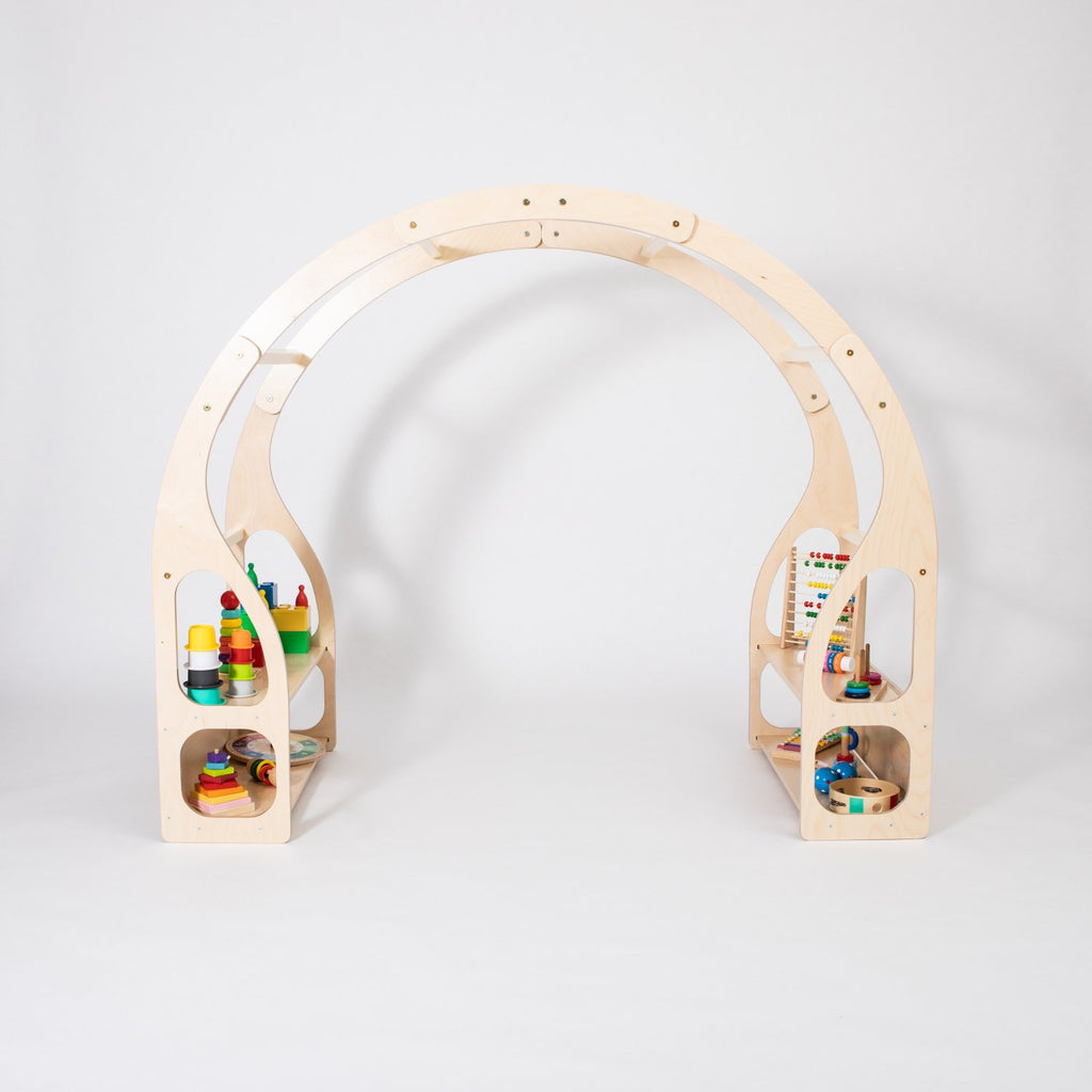 11. Montessori play stand with colorful toys on shelves in a white studio setting