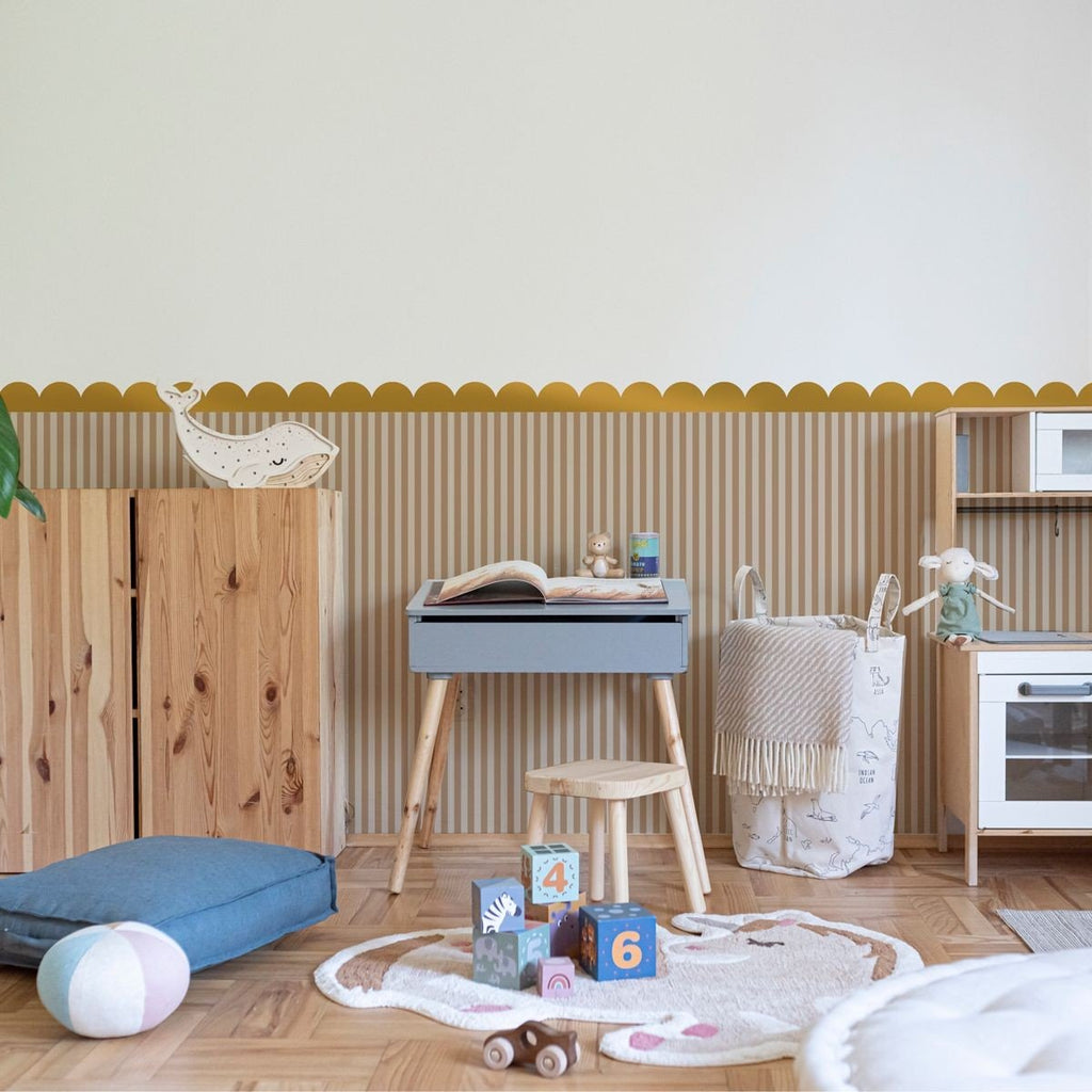 1. Children's room with golden circle wall stickers above wooden furniture and toys on the floor