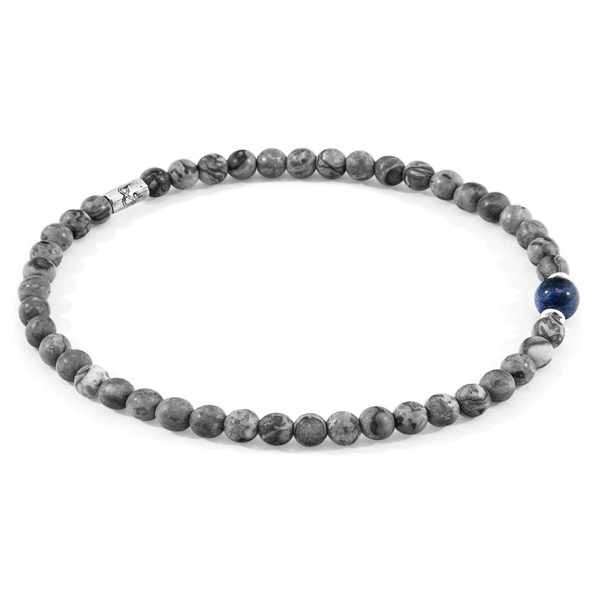 1. ANCHOR & CREW Walter Silver and Stone SKINNY Bracelet with grey jasper and blue sodalite stones, shown in studio setting