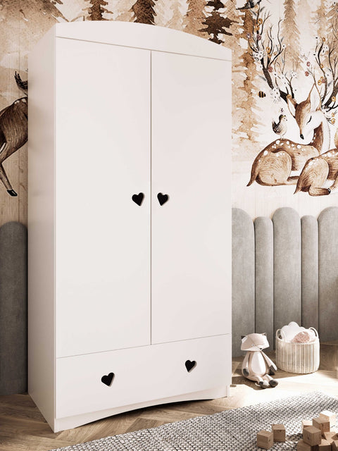 1. White Julia wardrobe with heart-shaped handles in children's room with woodland theme decor