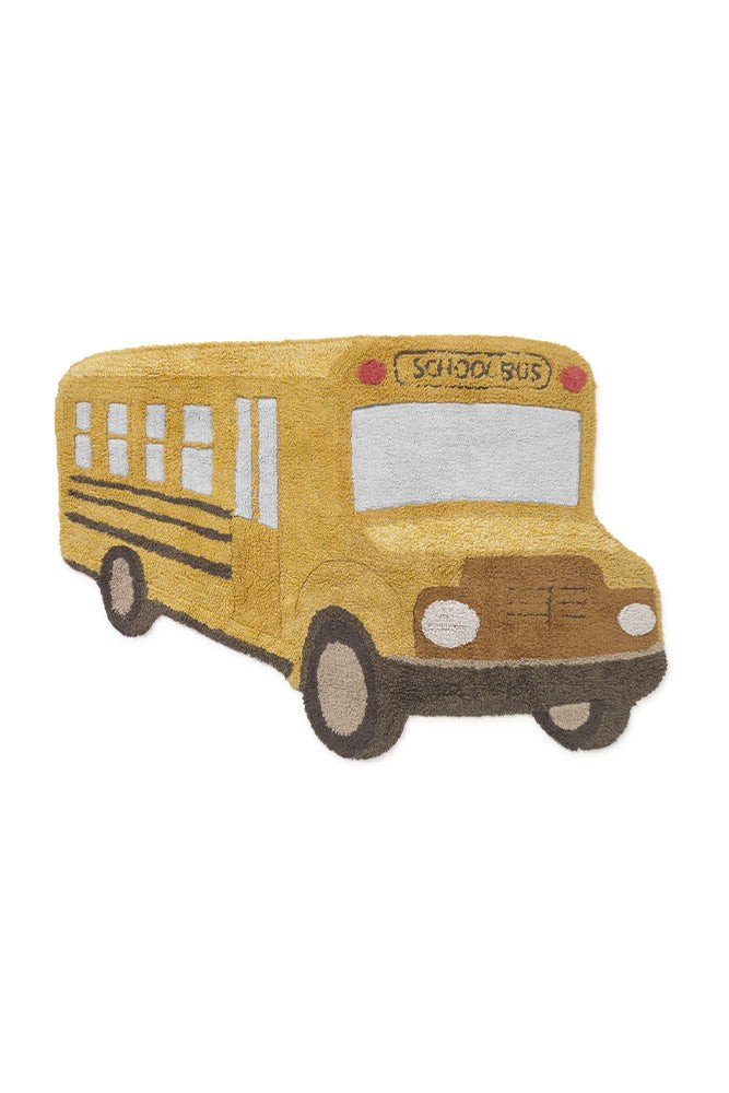 7. Studio shot of yellow school bus-shaped cotton rug, highlighting playful design and textured details