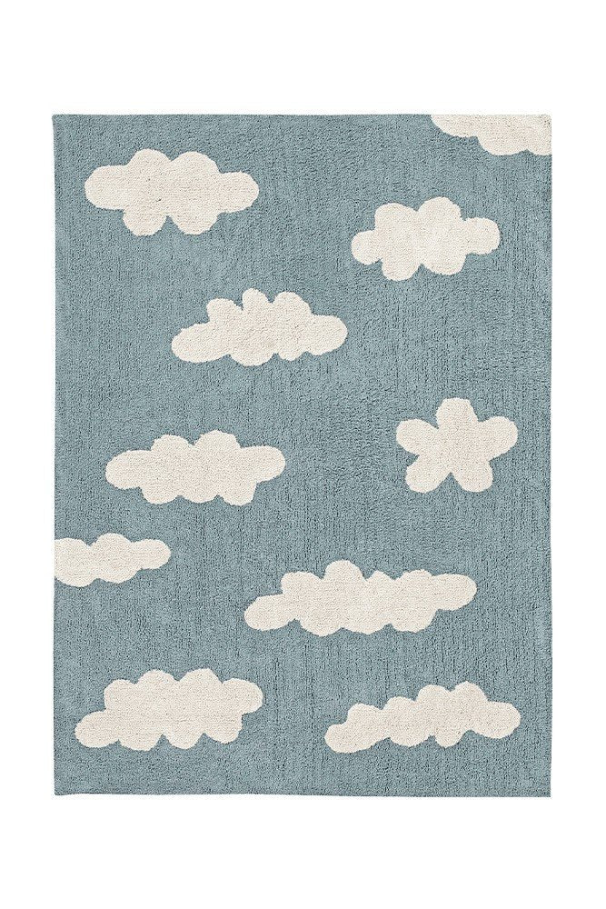 1. Blue washable rug with white cloud pattern, 120 x 160 cm, by Lorena Canals, shown in a full view on a plain background