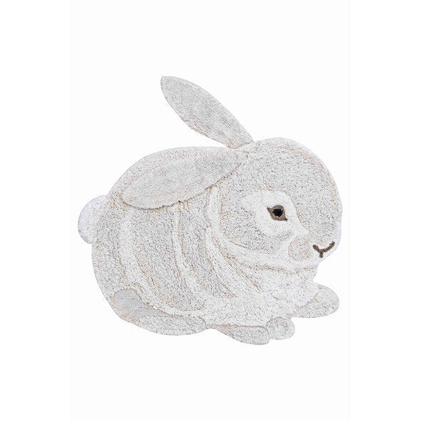 4. Flat lay of bunny-shaped rug in natural and ivory with movable ears and fluffy tail