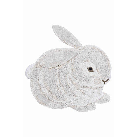 4. Flat lay of bunny-shaped rug in natural and ivory with movable ears and fluffy tail