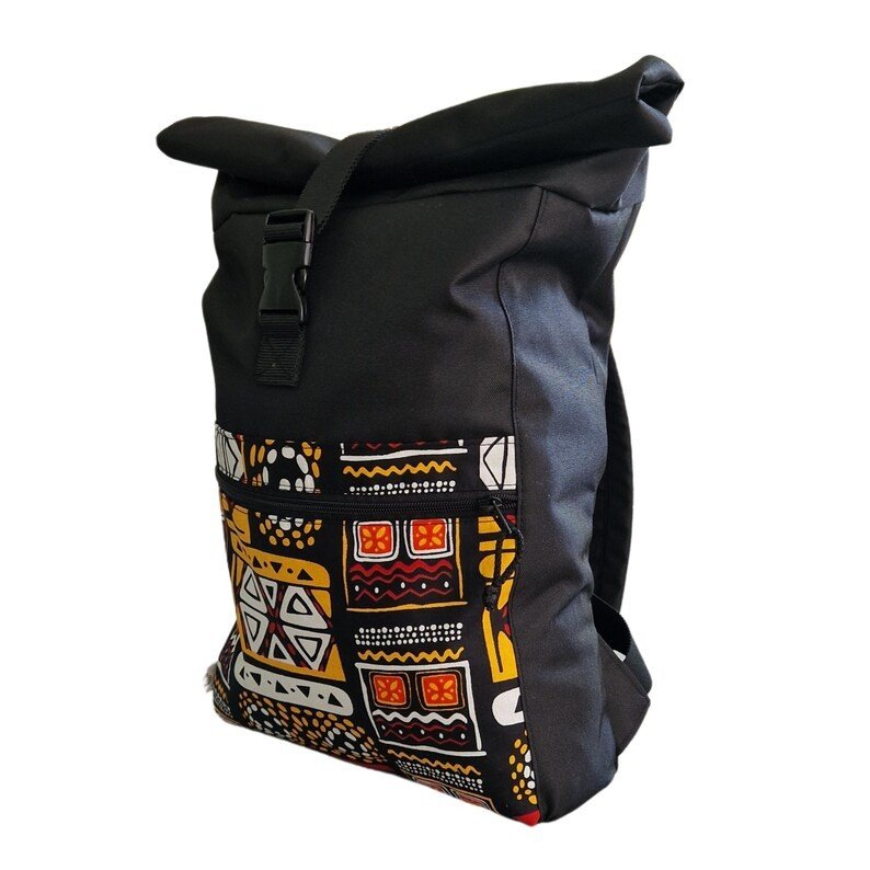 2. Side view of Drinbags waterproof rolltop backpack with yellow pattern, highlighting side pocket