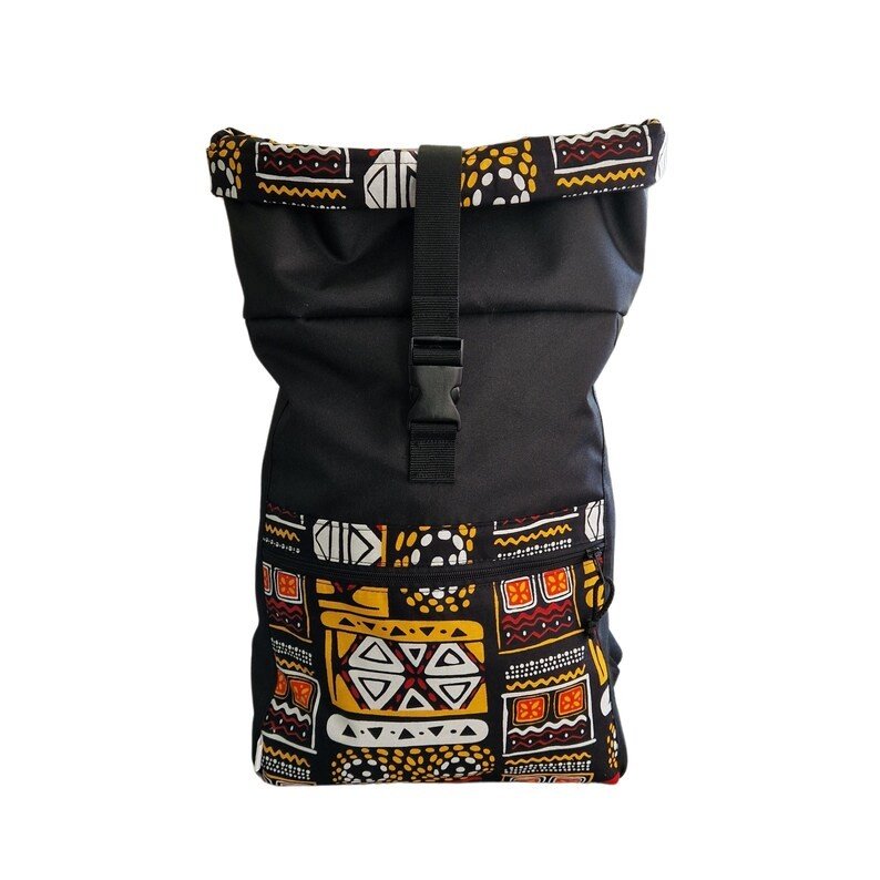 2. Drinbags waterproof rolltop backpack with yellow and orange pattern, front view in studio setting