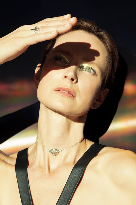 1. Woman wearing Hathor Harmony Choker in silver by New Vintage by Kriss, shown in lifestyle setting