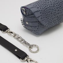 7. Close-up of Daz Studio's grey and blue leather shoulder bag, featuring silver-toned hardware and detachable strap