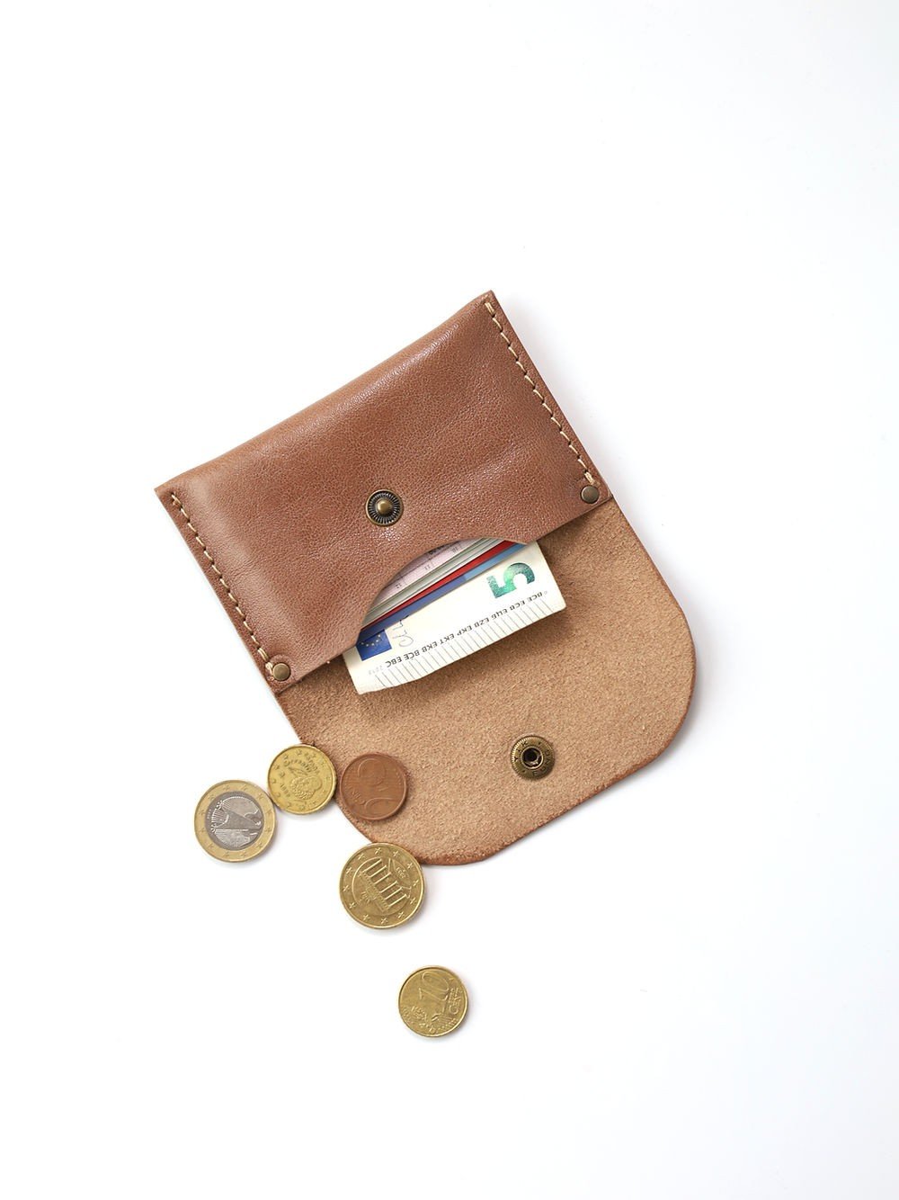 3. Open Toks Visoks WEEKEND wallet in cappuccino leather with cards and coins on white background