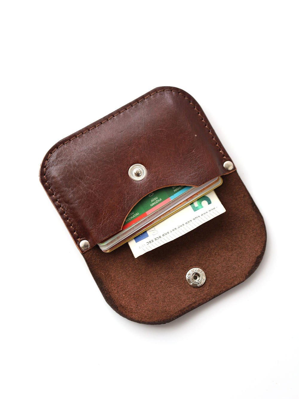 5. Open Toks Visoks leather wallet in brown and chestnut showing interior with cards and snap closure