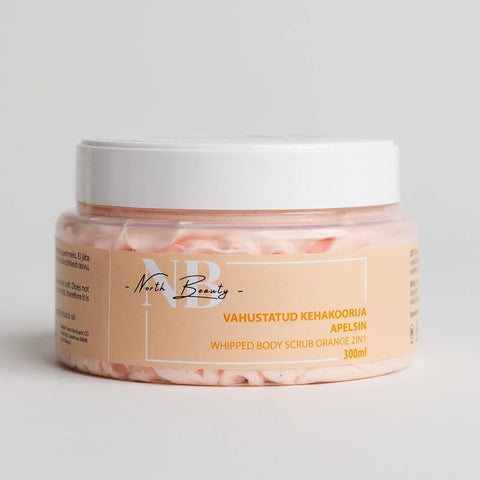1. North Beauty Whipped Sugar Body Scrub with Orange, 300 ml, in clear jar with beige label, studio shot