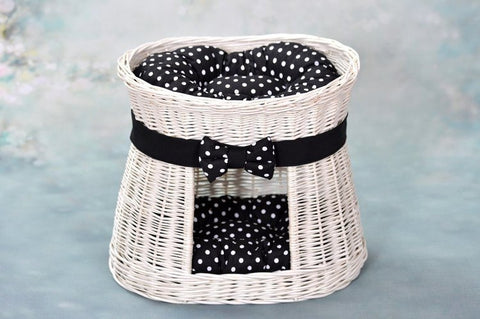 3. Front view of white wicker cat house with black polka dot cushions and decorative bow