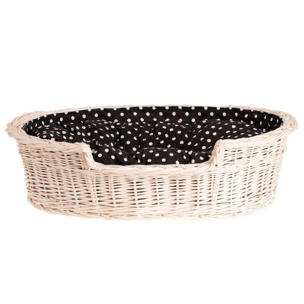 1. Whitewashed wicker dog bed with black polka dot cushion, front view, showing lowered edge for easy access