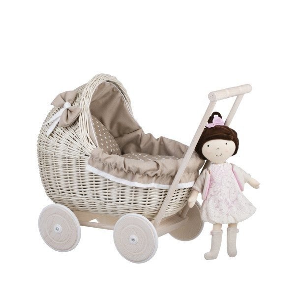 2. Whitewashed wicker doll pram with beige bedding and a doll attached to the handle