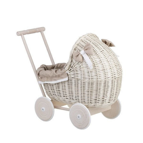1. Whitewashed wicker doll pram with beige bedding and wooden frame on white background