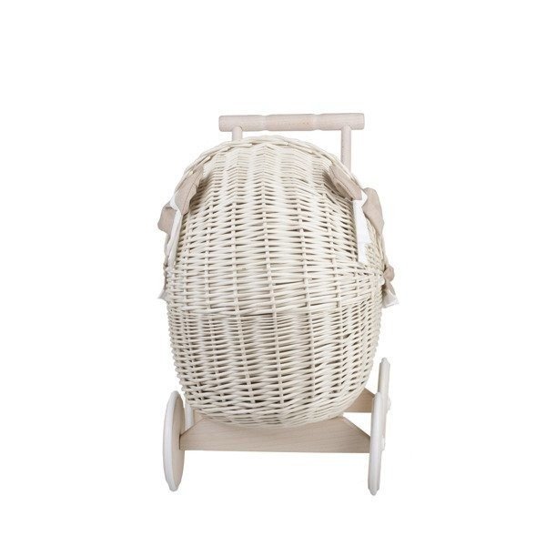 2. Front view of whitewashed wicker doll pram with beige bedding and wooden frame