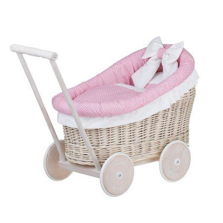 1. Whitewashed wicker doll pram with pink bedding and wooden frame, shown in a studio setting