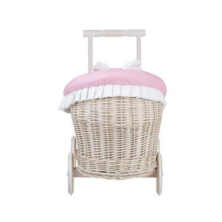 9. Rear view of whitewashed wicker doll pram with pink bedding, studio setting