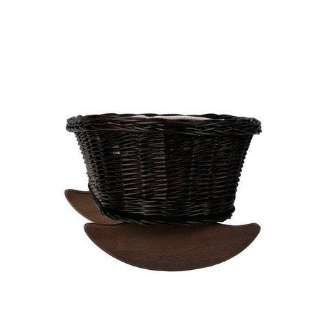 3. Side view of wicker rocking cradle showing dark wicker texture and curved wooden rockers
