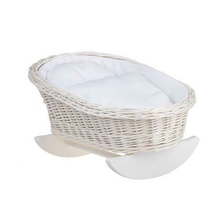 2. Wicker rocking cradle with white bedding on a white background, highlighting natural materials