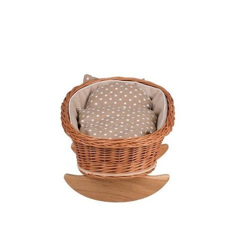 3. Top view of wicker rocking cradle with beige checkered bedding and wooden base