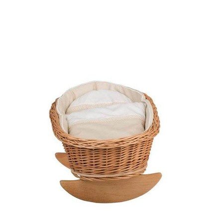 4. Front view of wicker rocking cradle with white bedding