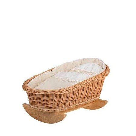 3. Wicker rocking cradle with white bedding shown from side angle
