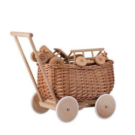 1. Wicker Stories toy trailer with wooden toys, featuring wicker basket and solid wooden wheels