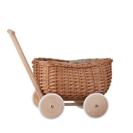 2. Side view of Wicker Stories toy trailer with wicker basket and wooden wheels