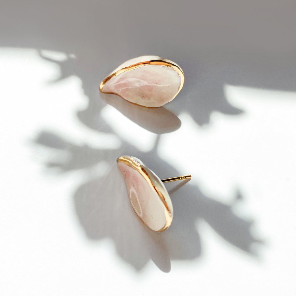 2. Close-up of SCULP Wild Cherry Leaf STUD earrings with ceramic pendant and 24K gold lustre