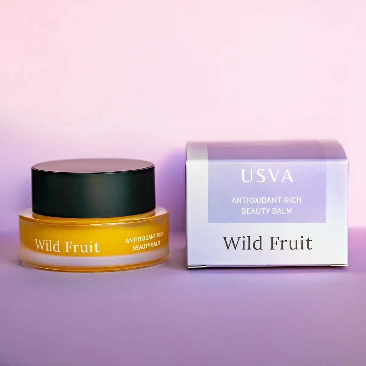 4. Usva Cosmetics Wild Fruit Beauty Balm with box on pink background