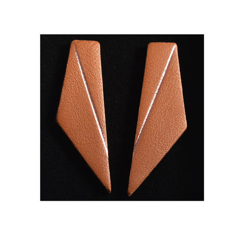5. Caramel brown Gerda Retter Design Short Wings Earrings on black background, showing geometric style