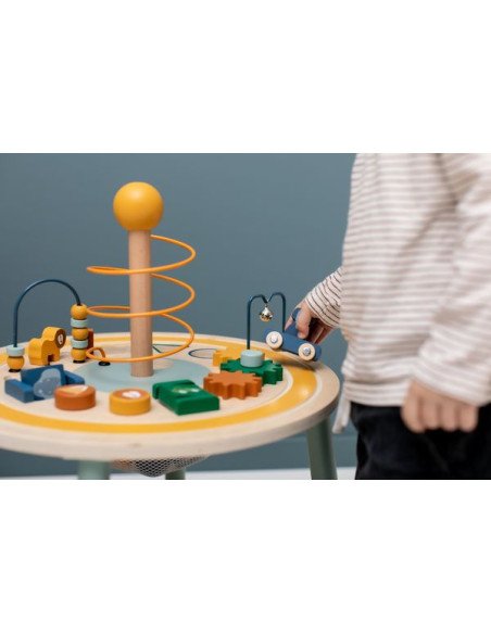 4. Child interacting with Trixie Baby Wooden Educational Table focusing on toy car track and gears