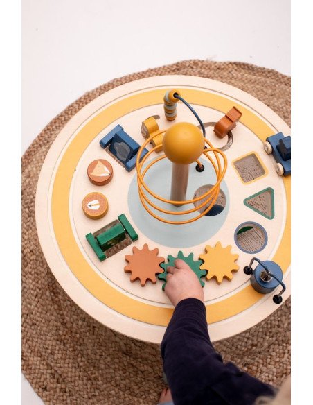 6. Top view of Trixie Baby Wooden Educational Table highlighting gears and toy car track