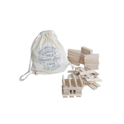 2. Studio shot of Wooden Story architectural blocks with branded drawstring bag, showcasing natural wood color and smooth finish